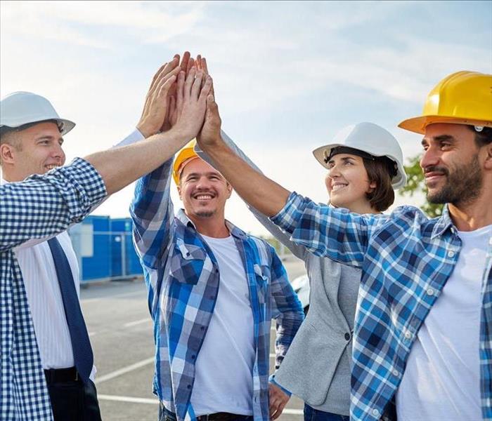 Image of a group of workers showing they are working together 