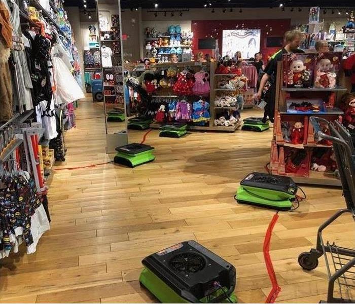 Image of drying equipment placed on floor after suffering flooding