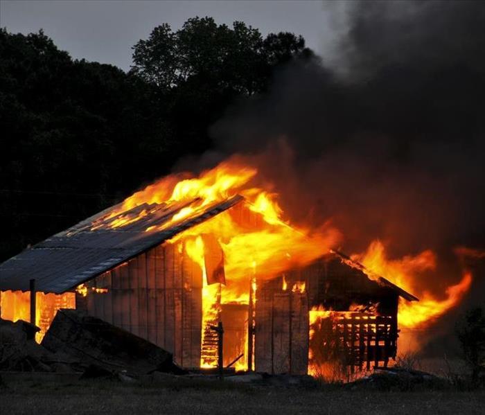 Image of a house on fire. 