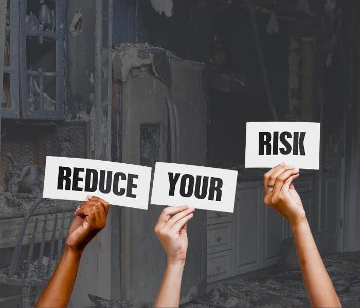 Background image of a burned house and in front of it some hands holding papers with messages that say Reduce Your Risk